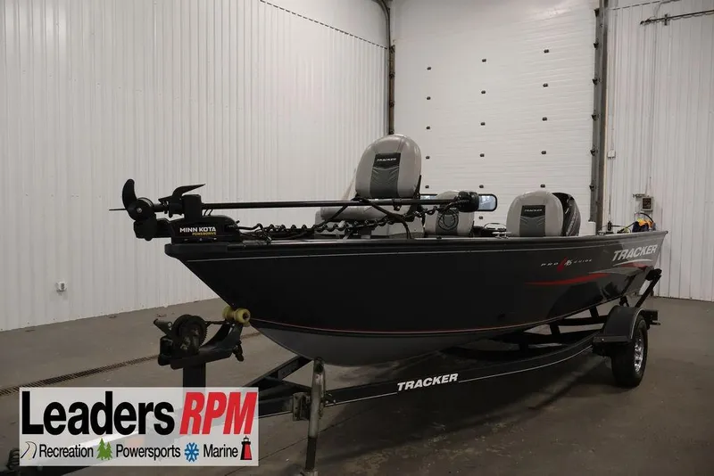 The Image of 2019 Tracker Pro Guide V-16 SC fishing boat in indoor showroom. - 2
