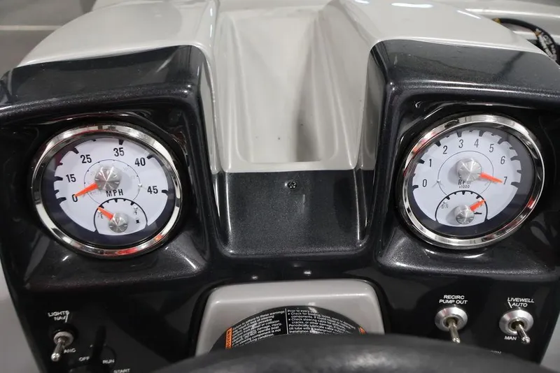 Slide: The Image of Dashboard of 2019 Tracker Pro Guide V-16 SC boat with speedometer and tachometer. - 20