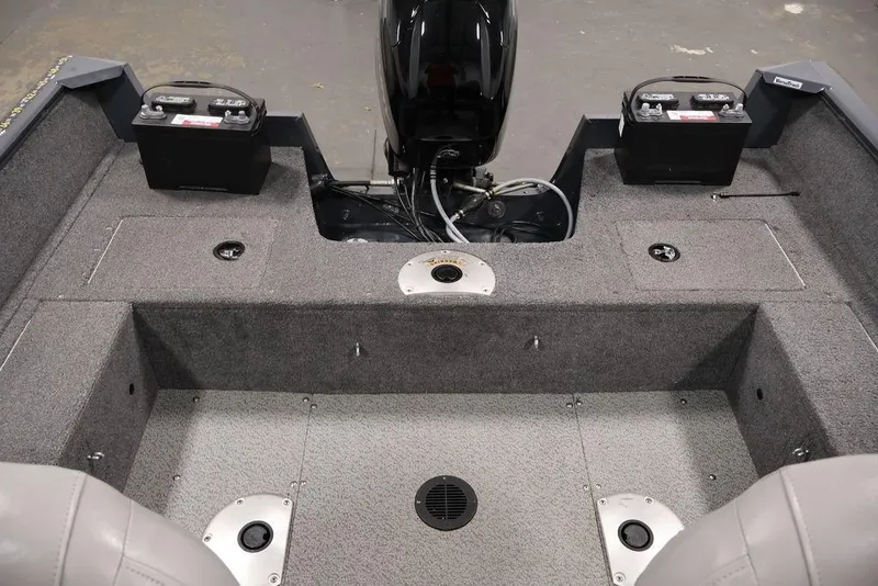 Slide: The Image of 2019 Tracker Pro Guide V-16 SC boat interior with motor and battery compartments. - 30