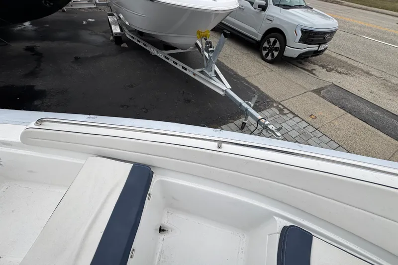 Slide: The Image of 2019 AB Inflatables Nautilus 15 DLX boat on trailer, parked beside a road. - 14