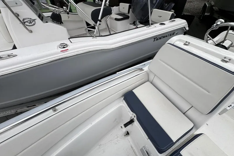 Slide: The Image of 2019 AB Inflatables Nautilus 15 DLX boat interior with white seating and sleek design. - 16