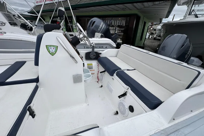 Slide: The Image of 2019 AB Inflatables Nautilus 15 DLX boat interior with seating and steering console. - 20