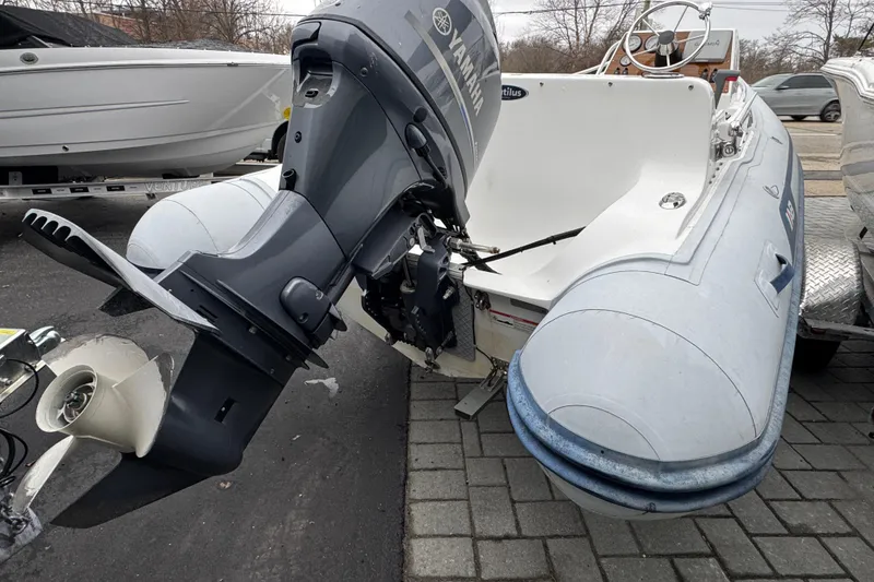 Slide: The Image of 2019 AB Inflatables Nautilus 15 DLX with Yamaha outboard motor on a trailer. - 3