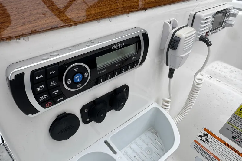 Slide: The Image of Control panel of 2019 AB Inflatables Nautilus 15 DLX with radio and microphone. - 9