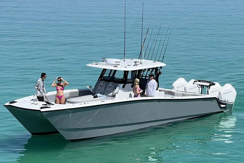 The Image of 2022 Freeman 37VH boat with people enjoying a sunny day on the water. - 0