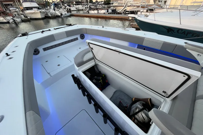 Slide: The Image of 2022 Freeman 37VH boat interior with open storage compartment at marina. - 10