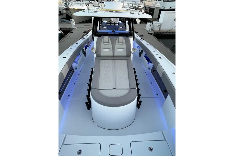 Slide: The Image of Luxurious 2022 Freeman 37VH boat interior with sleek seating and ambient lighting. - 11