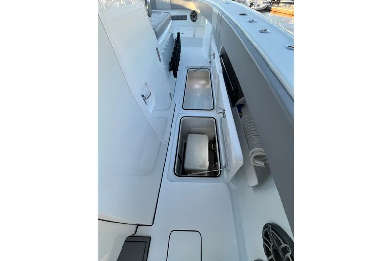Slide: The Image of Interior view of 2022 Freeman 37VH boat with open storage compartments. - 22