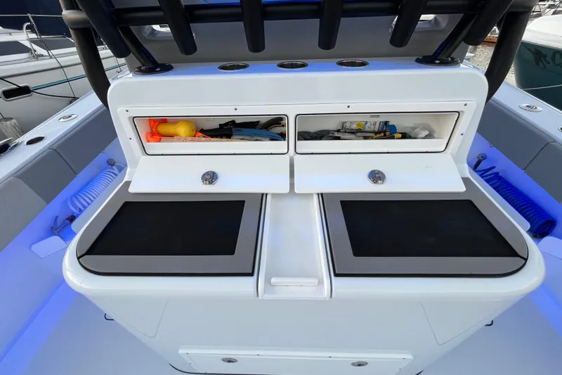 Slide: The Image of 2022 Freeman 37VH boat storage compartments with fishing gear and accessories. - 29