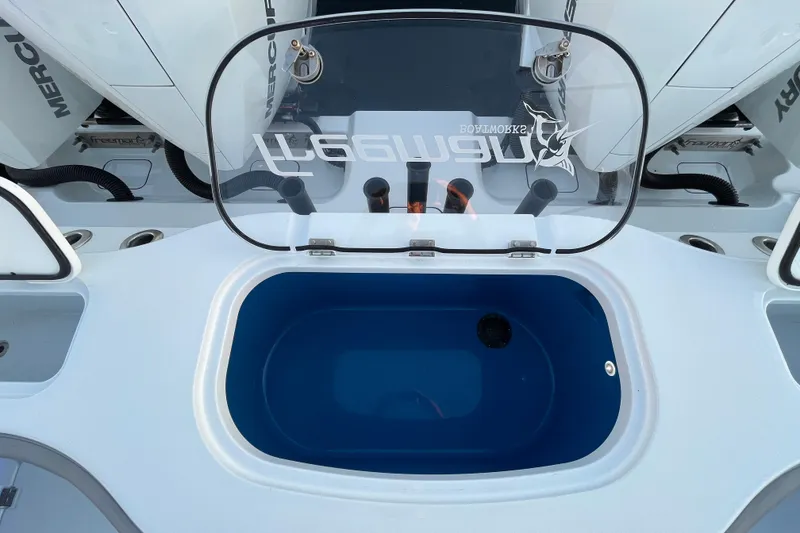 Slide: The Image of Livewell on a 2022 Freeman 37VH boat, featuring Mercury engines. - 32
