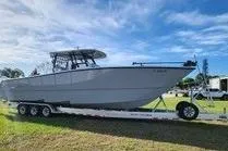 Slide: The Image of 2022 Freeman 37VH boat on trailer under blue sky. - 36