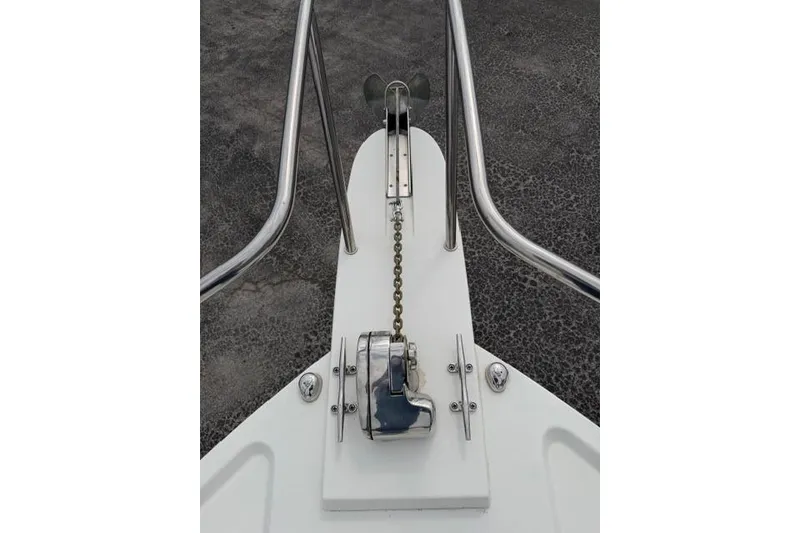 Slide: The Image of Bow of 2015 Parker 2520XLD boat with anchor chain and winch. - 3