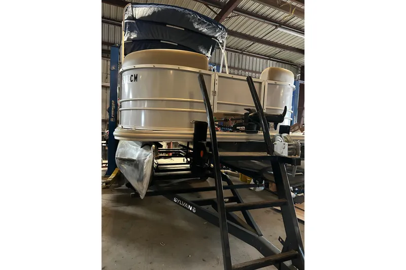 The Image of 2021 Sylvan Mirage Fish 820 CNF pontoon boat in a workshop setting. - 0