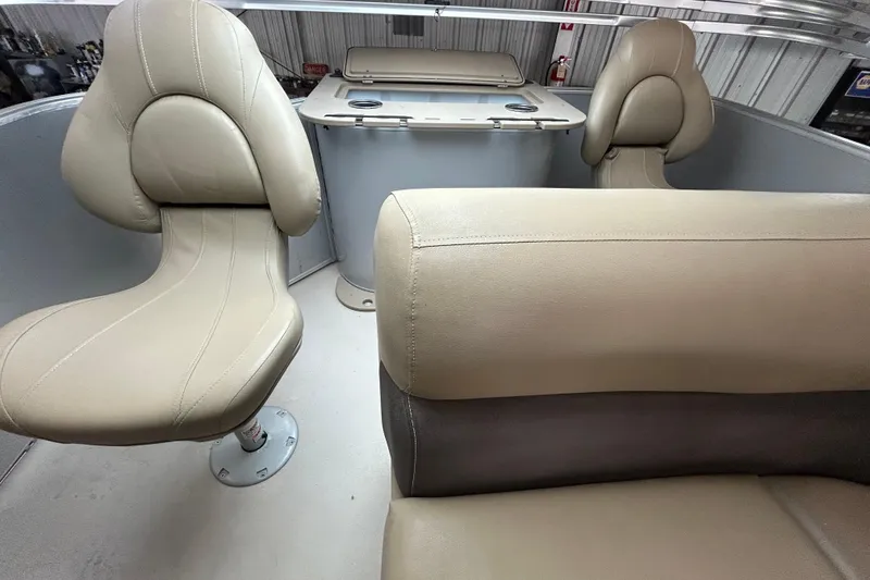 Slide: The Image of Interior of 2021 Sylvan Mirage Fish 820 CNF with beige seating and console. - 13