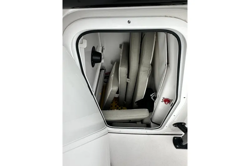 Slide: The Image of Dashboard of 2022 Sportsman Heritage 241 Center Console with digital display and controls. - 11