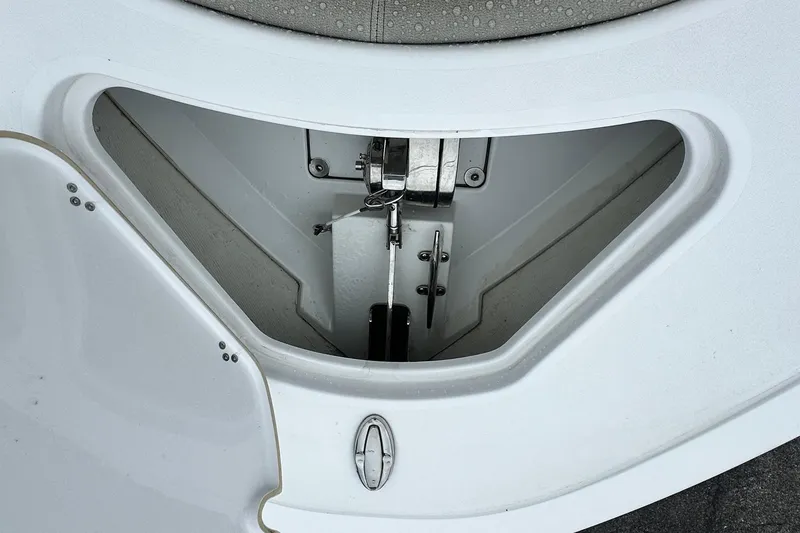 Slide: The Image of 2022 Sportsman Heritage 241 Center Console interior with cushioned seating and storage. - 15