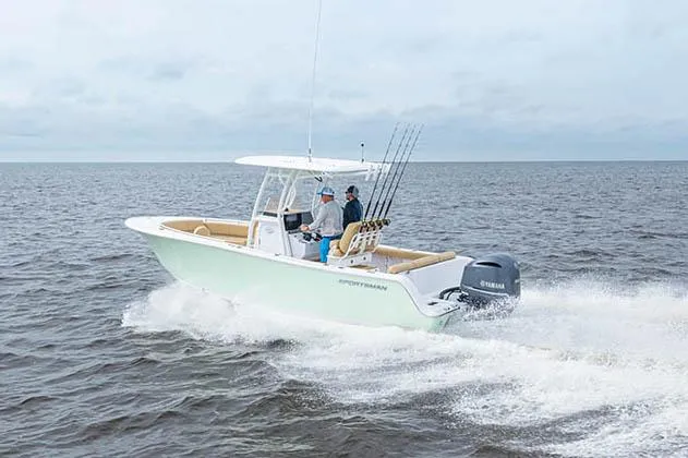 Slide: The Image of 2022 Sportsman Heritage 241 Center Console boat interior with seating and storage compartments. - 17