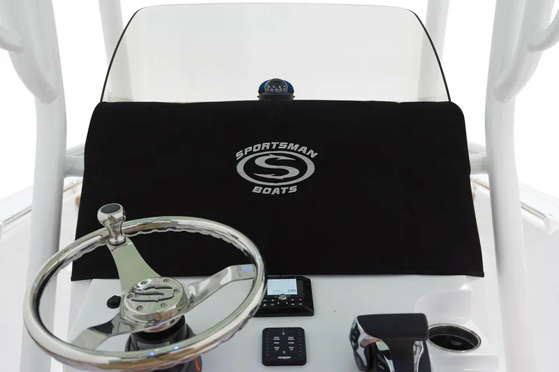 Slide: The Image of 2022 Sportsman Heritage 241 Center Console boat on trailer at marina dock. - 19