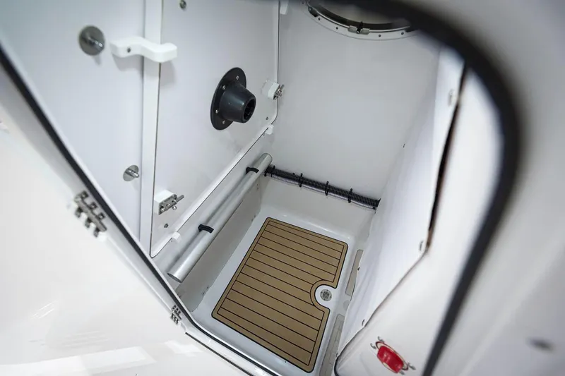 Slide: The Image of 2022 Sportsman Heritage 241 Center Console boat on trailer at marina. - 20