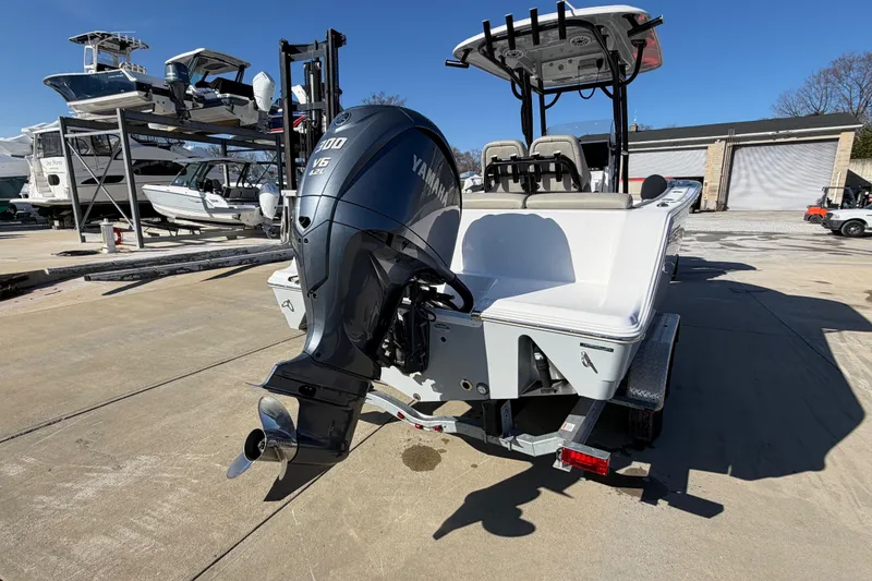 Slide: The Image of 2022 Sportsman Heritage 241 Center Console boat with Yamaha V6 engine on trailer. - 22