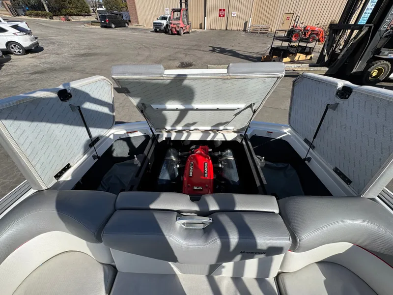 Slide: The Image of Engine compartment of a 2016 MasterCraft X30 boat with open hatch. - 17