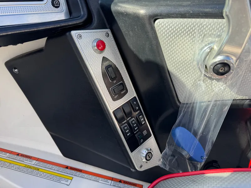 Slide: The Image of Control panel of a 2016 MasterCraft X30 boat with switches. - 20