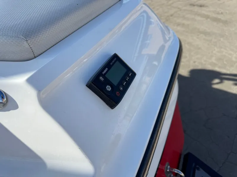 Slide: The Image of 2016 MasterCraft X30 boat with control panel. - 27