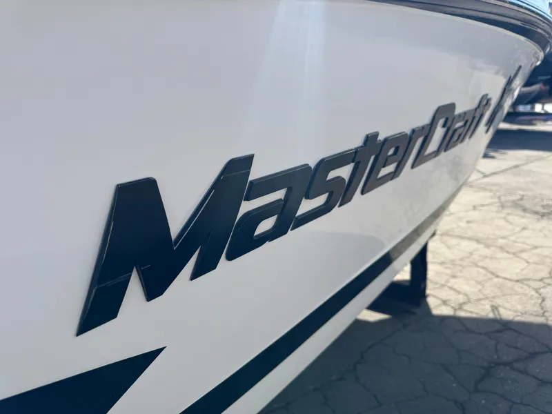 Slide: The Image of Close-up of MasterCraft X30 boat logo, year 2016. - 31