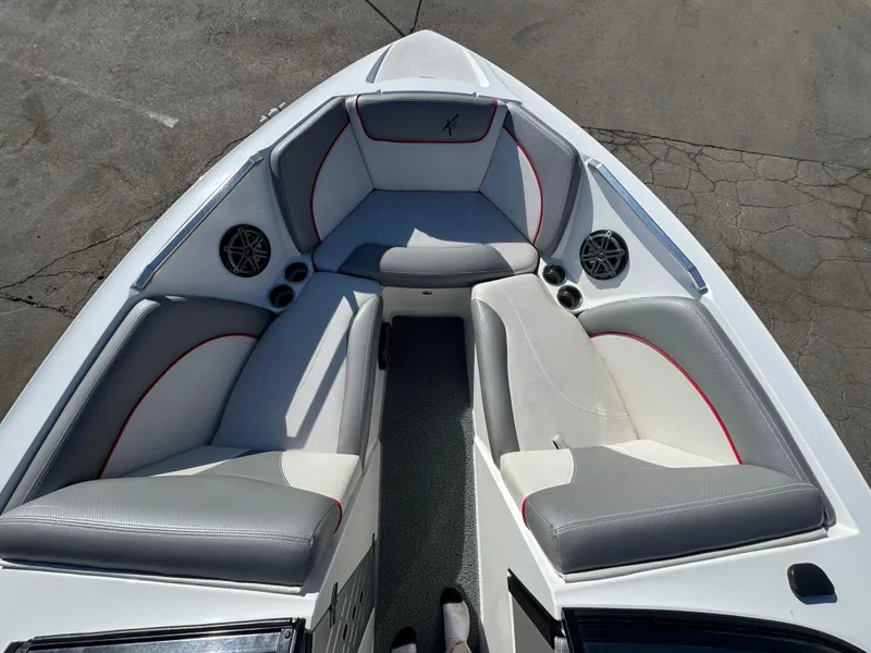 Slide: The Image of Interior of a 2016 MasterCraft X30 boat with gray and white seating. - 4