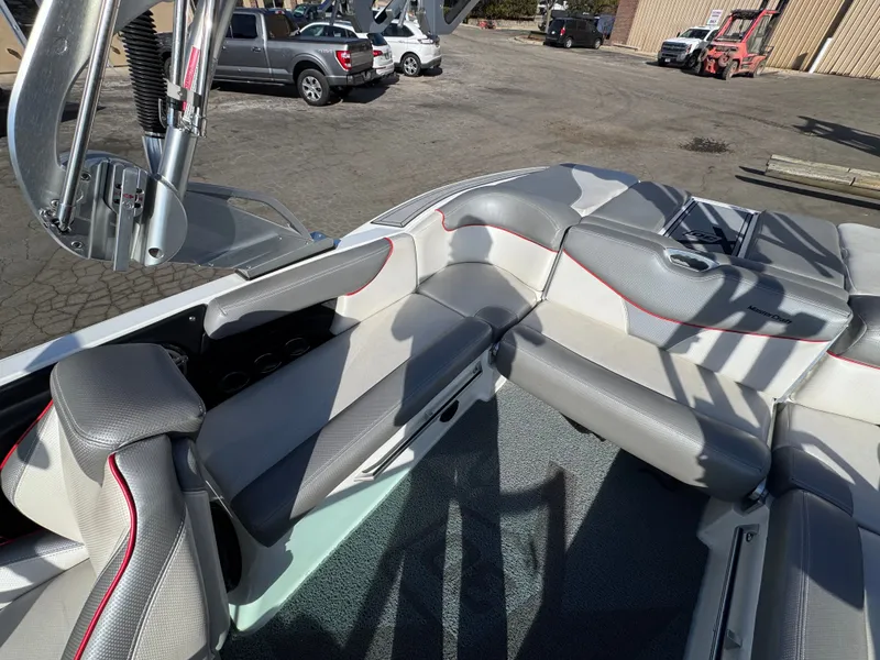 Slide: The Image of Interior of a 2016 MasterCraft X30 boat with gray seating. - 9