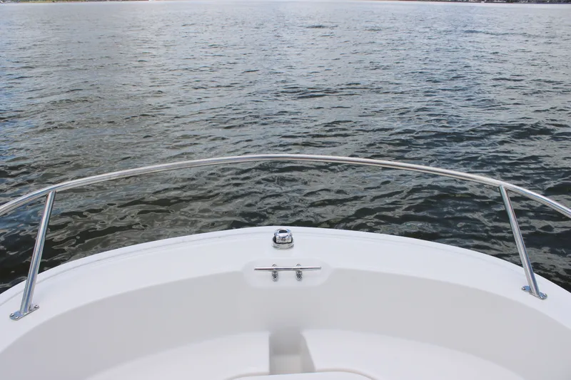 Slide: The Image of Bow view of a Boston Whaler 160 Super Sport on calm water. - 21
