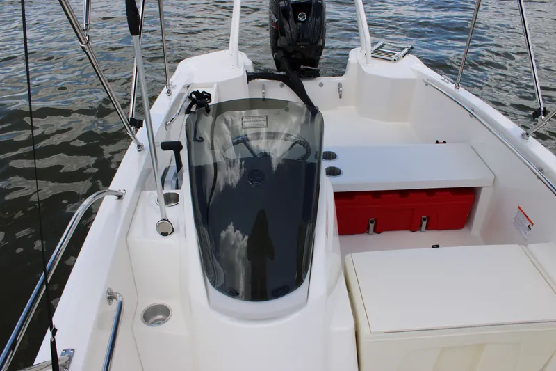 Slide: The Image of The image shows a 2026 Boston Whaler 160 Super Sport boat on the water. - 18