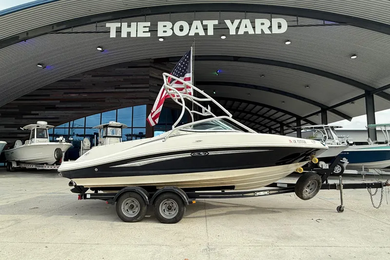 Slide: The Image of 2007 Sea Ray 210 Dual Console boat on trailer at The Boat Yard. - 1