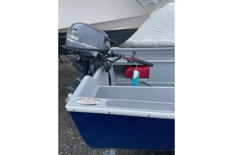 Slide: The Image of Boat with Yamaha outboard motor, Holland 14 model, 2026. - 7