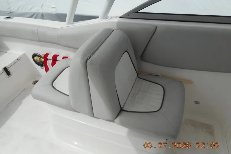 Slide: The Image of Interior seating of 2021 Sea Fox 226 Traveler boat, featuring gray upholstery. - 13