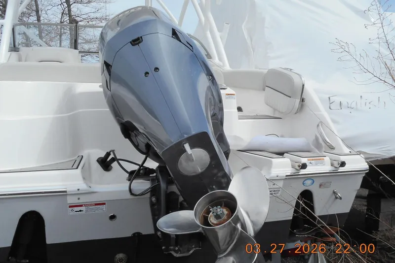 Slide: The Image of 2021 Sea Fox 226 Traveler boat with powerful outboard motor, docked and ready for adventure. - 3