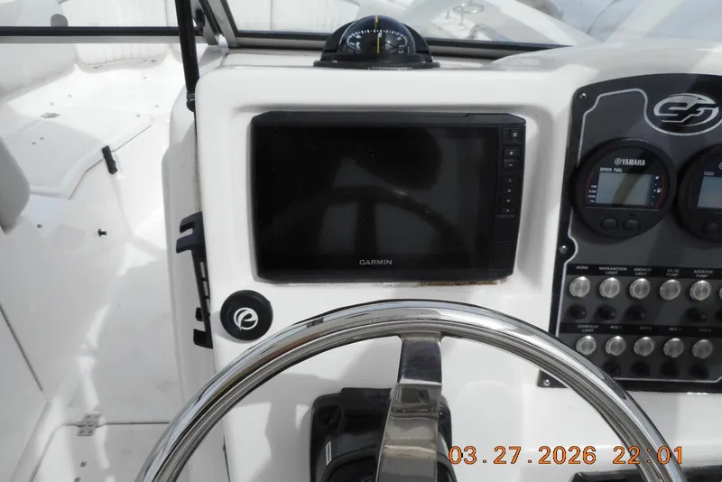 Slide: The Image of 2021 Sea Fox 226 Traveler dashboard with Garmin display and Yamaha gauges. - 7