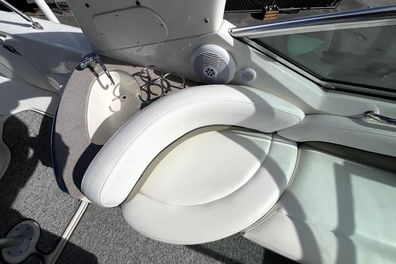 Slide: The Image of Interior of 2007 Sea Ray Sundancer 260 boat with seating and speaker system. - 35