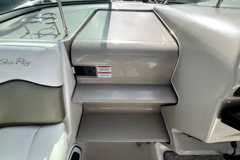 Slide: The Image of Interior of 2007 Sea Ray Sundancer 260 boat with seating and cup holders. - 42