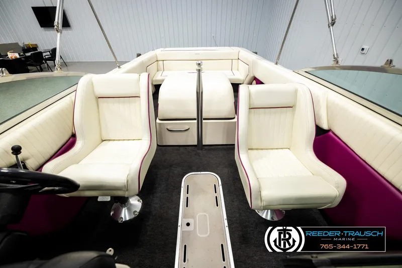 Slide: The Image of Interior of a 1993 American Skier Eagle boat with white and purple seating. - 16