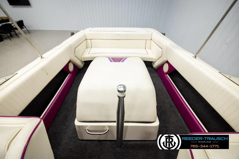 Slide: The Image of Interior of a 1993 American Skier Eagle boat with white and purple seating. - 22