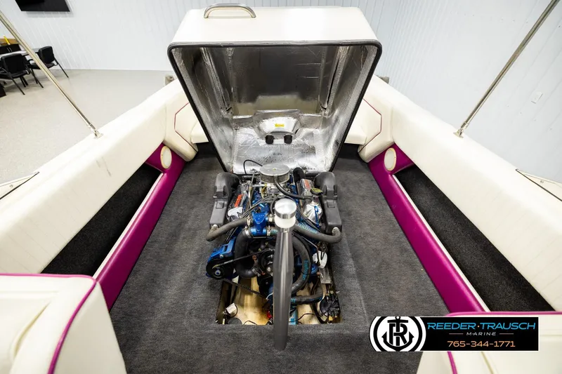 Slide: The Image of Open engine compartment of a 1993 American Skier Eagle boat, showcasing interior details. - 23