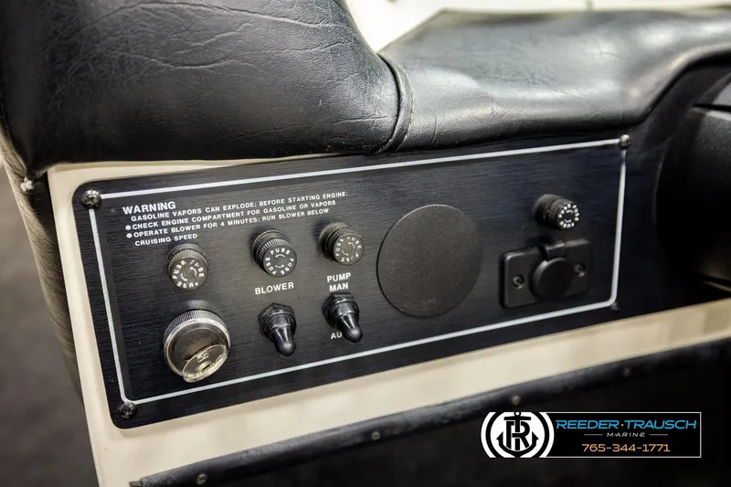 Slide: The Image of Control panel of a 1993 American Skier Eagle boat with warning labels and switches. - 30