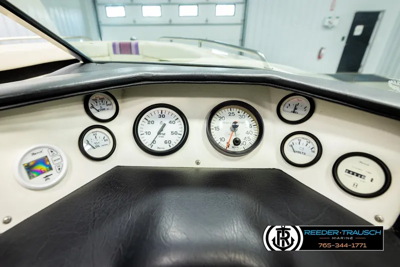 Slide: The Image of Dashboard of a 1993 American Skier Eagle boat with various gauges and controls. - 31