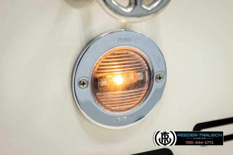 Slide: The Image of Close-up of a 1993 American Skier Eagle boat light with Perko branding. - 43