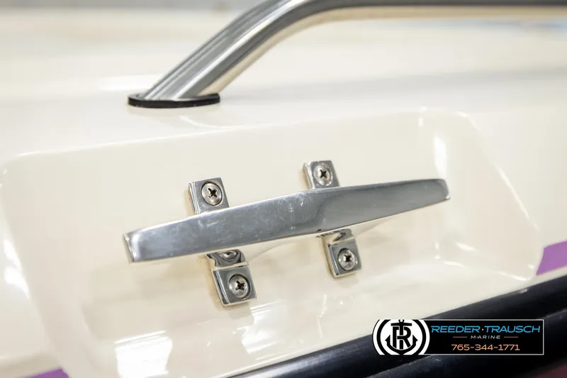 Slide: The Image of Close-up of a 1993 American Skier Eagle boat cleat with Reeder-Trausch Marine logo. - 49