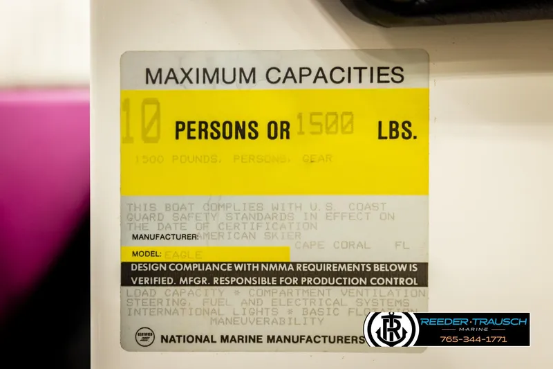 Slide: The Image of 1993 American Skier Eagle boat capacity label, 10 persons or 1500 lbs, safety compliance details. - 50