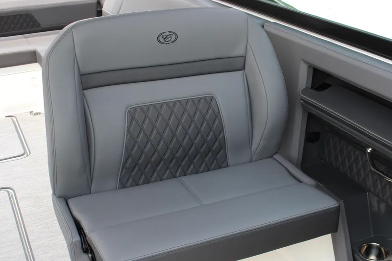 Slide: The Image of Luxurious seating in 2025 Cobalt R33 Surf boat with diamond-stitched upholstery. - 7