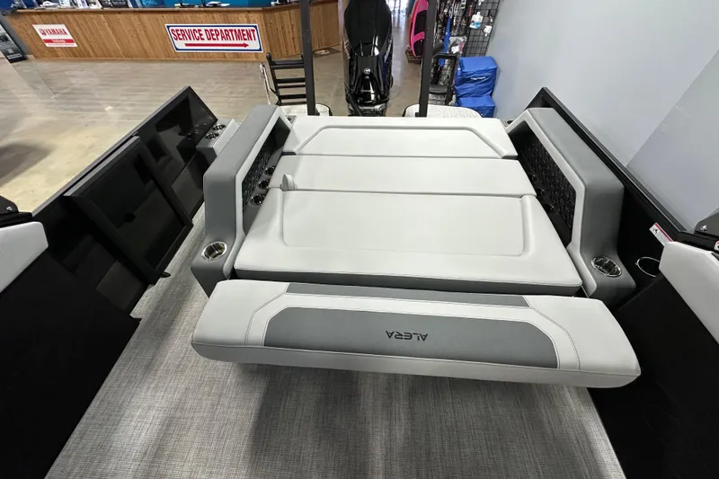 Slide: The Image of 2026 Alera M25L boat interior with sleek seating and modern design. - 13