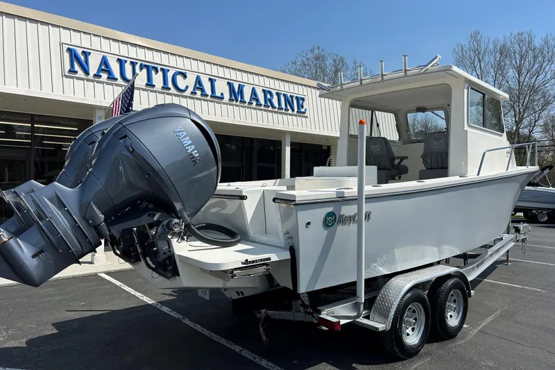 Slide: The Image of 2026 May-Craft 245 Pilot House boat with Yamaha engine at Nautical Marine dealership. - 7